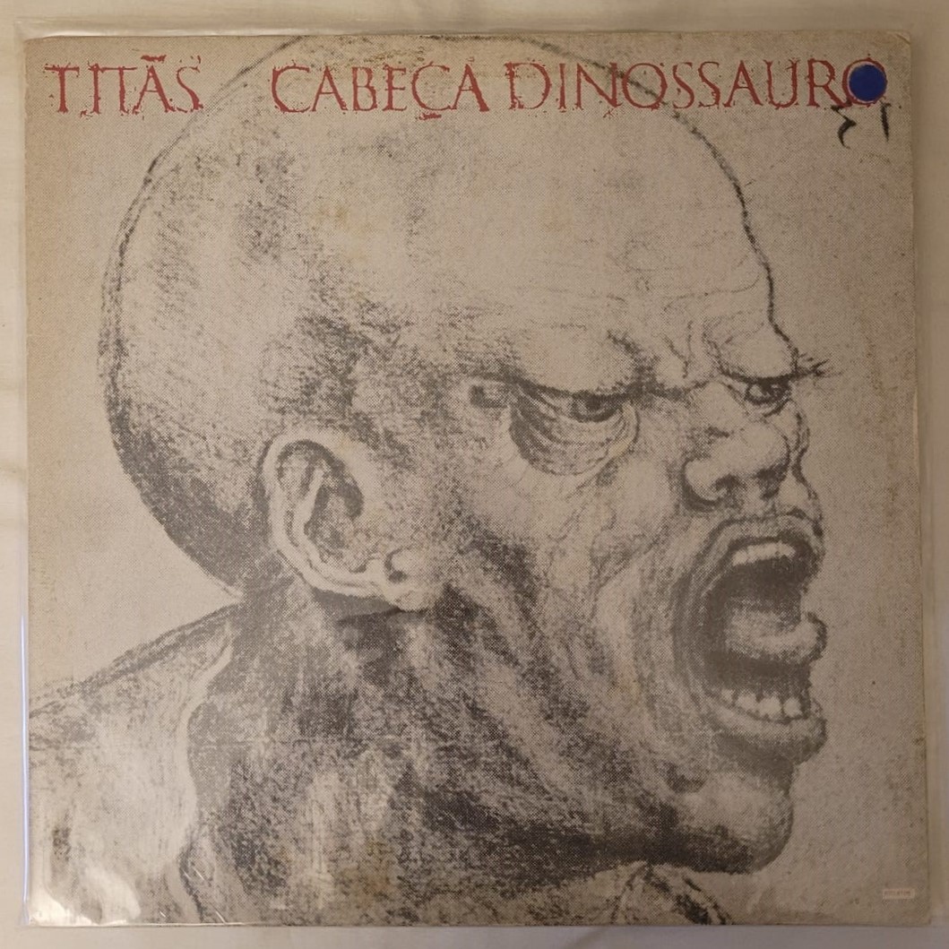 Titãs - Cabeça Dinossauro